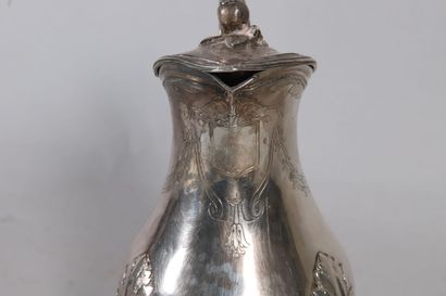 null Silver selfish coffee pot, the baluster body with engraved decoration of laurels...