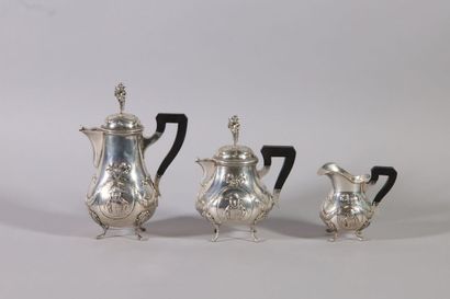 null Three-piece silver service including a teapot, a coffee pot and a milk jug,...
