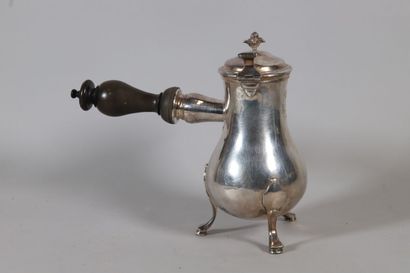 null Silver coffee pot, the baluster body engraved with a coat of arms under a crown,...