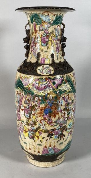 null CHINA, Nanjing 
A large enamelled stoneware baluster vase decorated with a battle...