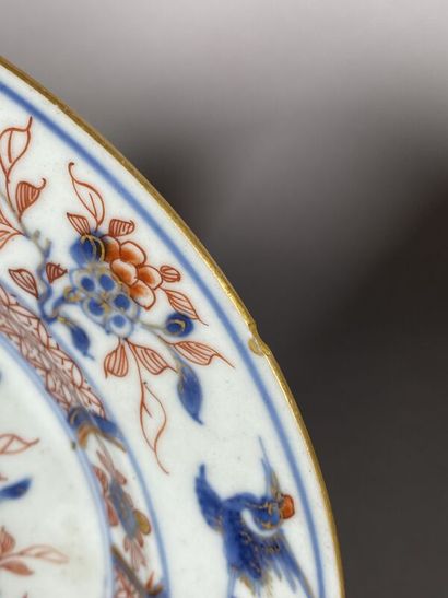 null CHINA / JAPAN
Three porcelain plates with Imari decoration of a flowering basket...