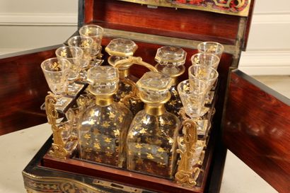 null Boulle style marquetry liquor cabinet including four bottles and sixteen crystal...