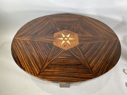 null Coffee table in Macassar ebony veneer, the top inlaid with a star, in the center...
