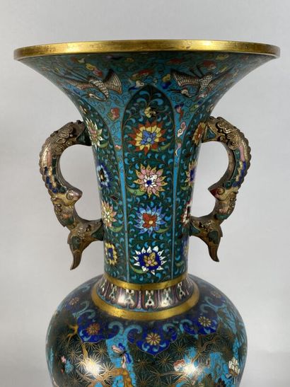 null CHINA, early 20th century
A pair of ormolu and cloisonné vases with flared necks...