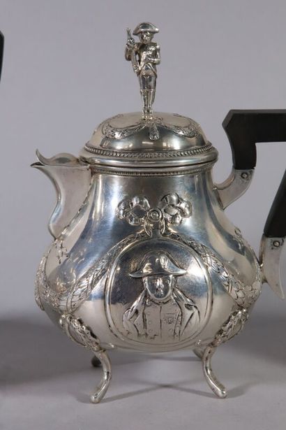 null Three-piece silver service including a teapot, a coffee pot and a milk jug,...