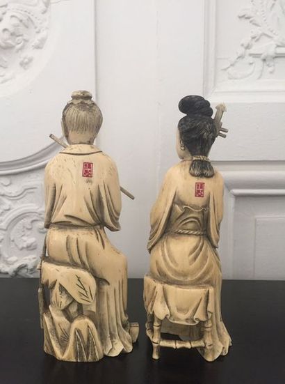 null CHINA Pair of ivory subjects representing musicians. Red stamp on the back....