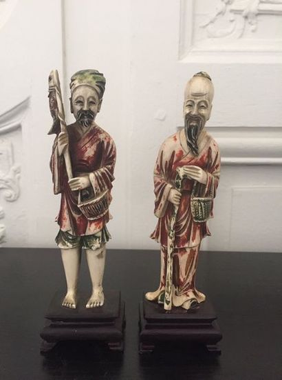 null CHINA Pair of polychrome ivory subjects representing fishermen. Around 1940...