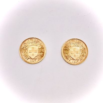 null TWO 20 Swiss Francs gold coins with Helvetia's profile dating from 1947 workshop...