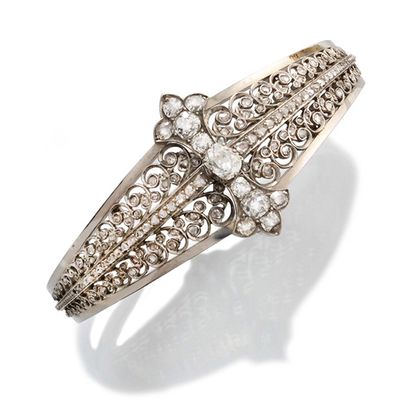 null RIGID BRACELET in 750-thousandths white gold, silver and brilliant-cut diamonds...