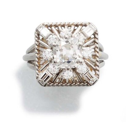 null RING in platinum and thirteen modern brilliant-cut diamonds, baguette and the...