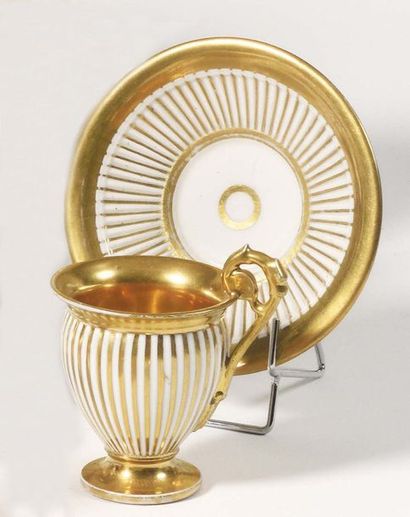 Paris Pedestal cup with high handle and its...