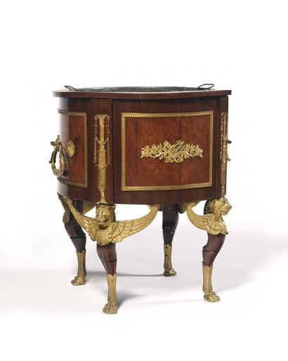 null Large round mahogany and mahogany veneer planter with a rich decoration of gilded...