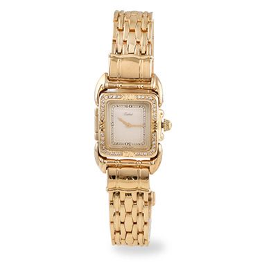 null TABBAH "SAGA" around 2000 Lady's wristwatch in 18k yellow gold. Bezel set with...