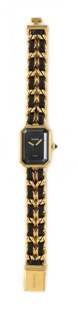 null CHANEL "First" Ref.H0001 around 1987 Lady's bracelet watch in vermeil. Black...