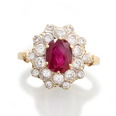 null POMPADOUR RING 

in 750-thousandths yellow gold, oval-cut rubies of about 2.40...