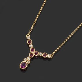 null NECKLACE 

in 750-thousandths yellow gold with a central pampille motif adorned...