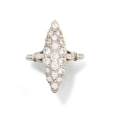null MARQUISE RING 

in 750-thousandths chiselled white gold adorned with twenty-one...