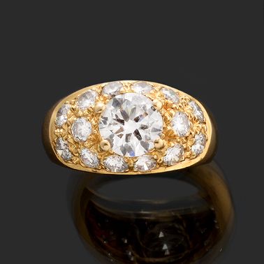 null JONC RING 

in 750-thousandths chiselled yellow gold adorned with fifteen modern...