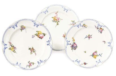 null SÈVRES Three small palm plates in soft porcelain with polychrome decoration...