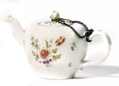 null VIENNA Porcelain covered teapot with polychrome decoration of flower bouquets....
