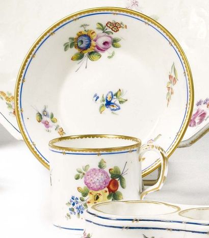 null SEVRES (KIND OF) Lemon cup and its porcelain saucer with polychrome decoration...
