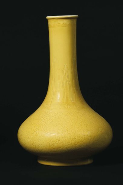 null CHINA Long cylindrical neck vase with incised decoration on a yellow lotus background...