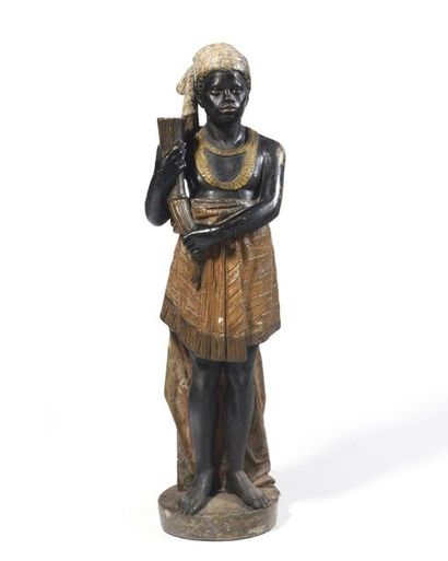 null EXCEPTIONAL NUBIAN FIGURE in painted stone, holding a flare. Early 19th century...