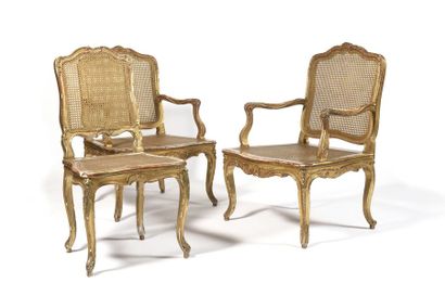 null PAIR OF FAUTEUILS AND A CHAIR with a moving backrest in partially gilded wood...
