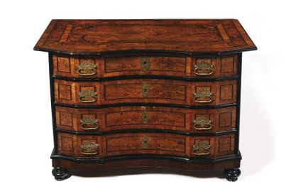 null COMMODE in walnut veneer, burr walnut and maple, the moving and curved front...