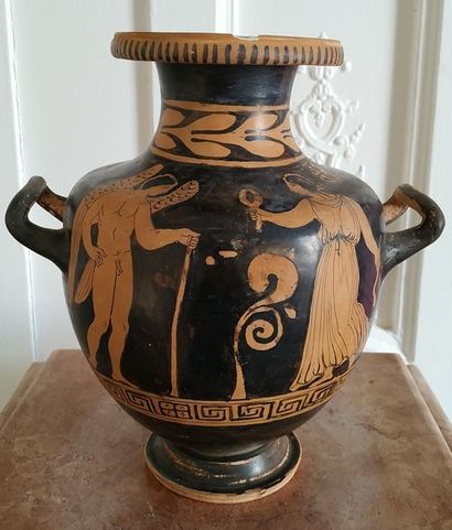 null Red-figure HYDRIE. Black glazed terracotta, various restorations including the...