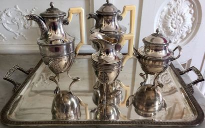 null SERVICE A THE and CAFE in silver carved with water leaf friezes, pouring spouts...