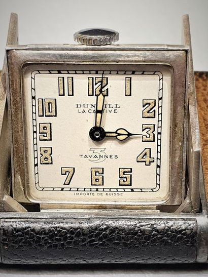 null MAISON DUNHILL ET TAVANNES. “La Captive”, vers 1920. Rare petite montre de poche...