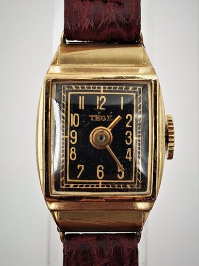 null GETE "Tank", vers 1930 Charmante petite montre de femme en or jaune 18k. Boitier...