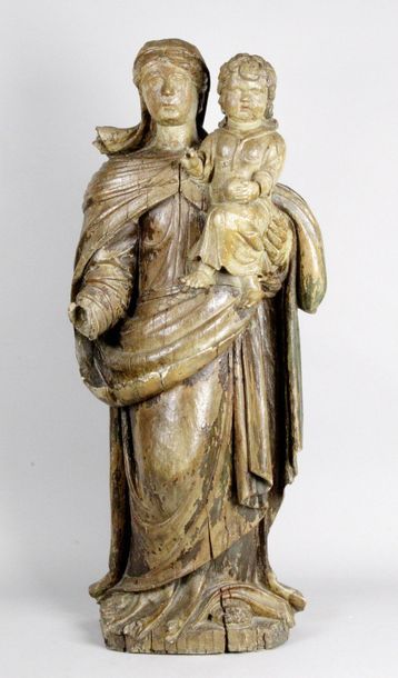 null FRANCE, XVIIe siècle VIERGE À L’ENFANT en chêne sculpté avec restes de polychrome...