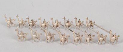 null SUITE OF EIGHT 925/1000 silver knife holders depicting llamas. Latin American...