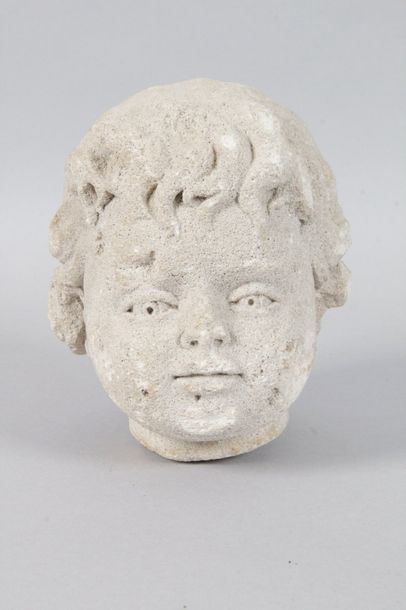 null HEAD OF ANGELOT in limestone, XIX century. H: 16 cm