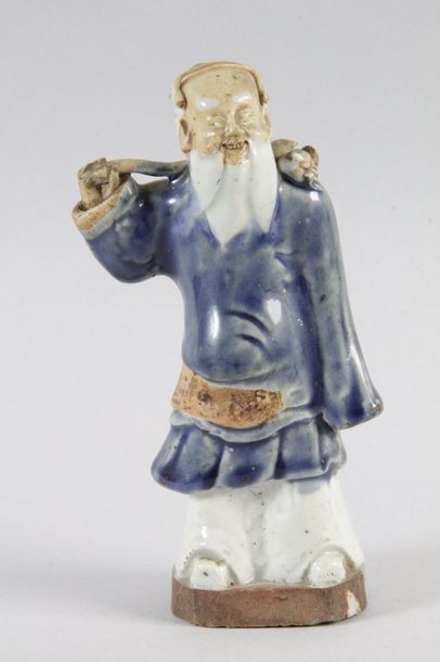 null CHINA Enamelled stoneware statuette representing a standing dignitary. 18th...