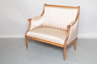 null MARQUISE in moulded natural wood is carved with rosettes, armrests with winding...