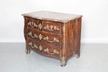 null GALBE FACADE COMMODE, in veneer and marquetry with four drawers on three rows....