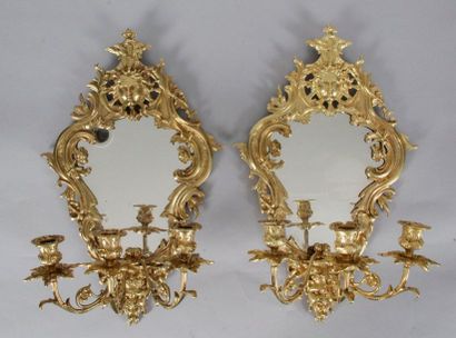 null Pair of Regency style sconces in moulded and sculpted bronze with a man's face,...