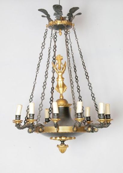 null Antique chandelier with twelve arms of light in bronze and gold-plated and black...
