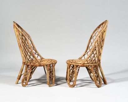 null WORK OF THE 1970s Pair of small rattan gondola chairs with circular seat and...