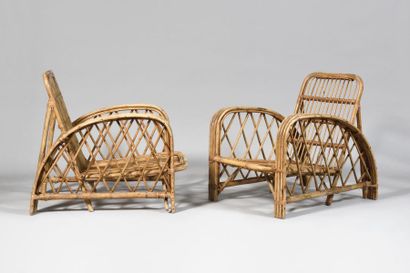 null Pair of rattan armchairs with slanted back between two arched armrests Height:...