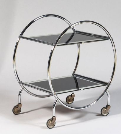 null LE GOÛT DE JACQUES ADNET Table roulante en tubes métallique chromé à côtés circulaires...