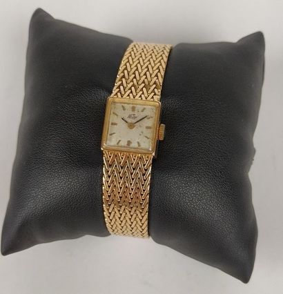null FEUDOR vers 1950 Montre bracelet de dame en or jaune 18 k.Bracelet à maille...