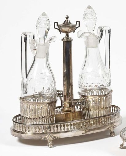 null Vinegar oil tanker in cut crystal, the silver frame has a column topped by a...