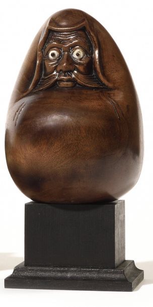 null Japan Okimono figure in carved wood representing Daruma, the eyes in ivory removable....