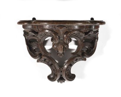 null Sconce of wall lamp of animated shape, in chestnut tree carved with foliage...