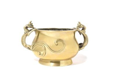 null China Circular bronze perfume burner with two chimera-shaped handles. On the...