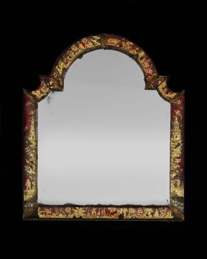 null Eglomerated glass mirror, with a contoured shape, decorated with characters,...